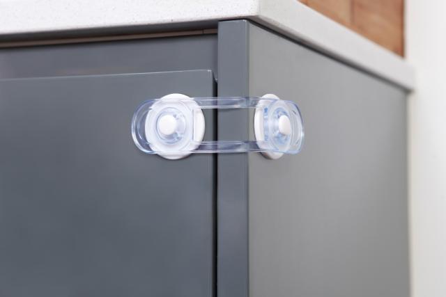 DREAMBABY MINI BØRNESIKRING T/ LÅGER - TRANSPARENT