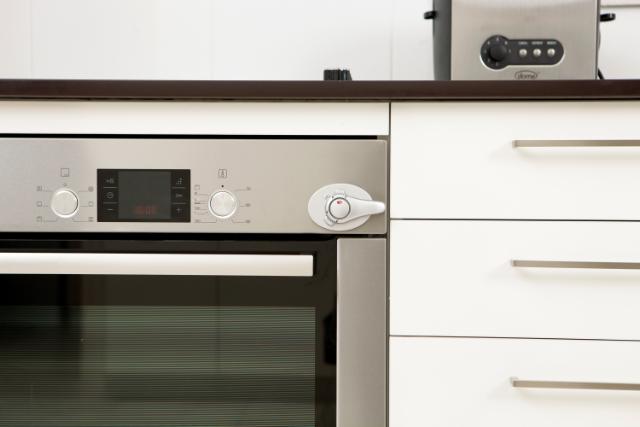 DREAMBABY BØRNESIKRING MED LÅS - GRÅ